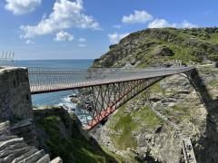 The new bridge (opened 2019) across to Tintagel Castle. Taken the day before the walk, hence the blue sky!